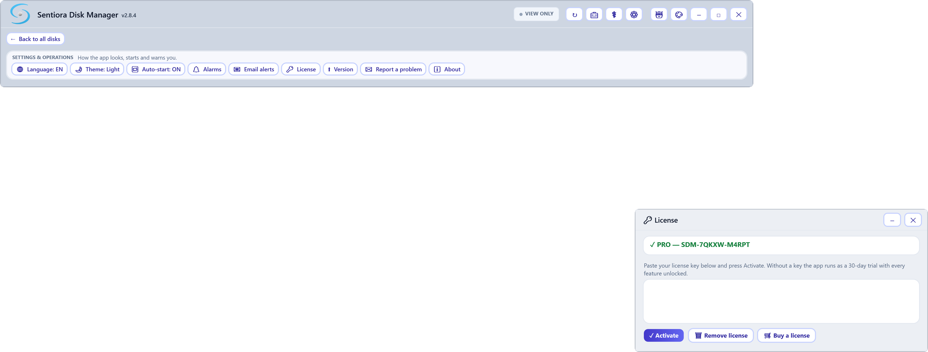 The licence window showing an active PRO licence with its serial, an empty key box, and Activate, Remove license and Buy a license.